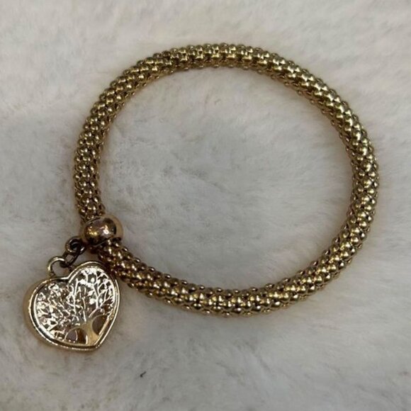 Woman’s charm bracelet. Stretchy. Gold in colour. Excellent condition. - Picture 1 of 6